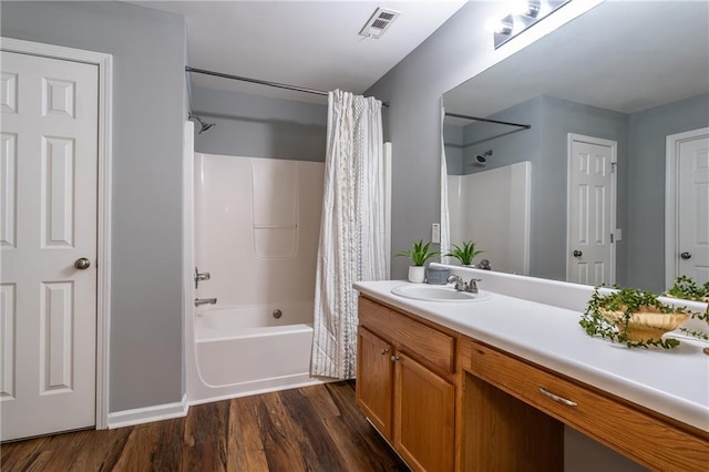 208 Oconee Way, Canton, GA 30114 - bathroom with wood finished floors, shower / bath combination with curtain, vanity, and baseboards