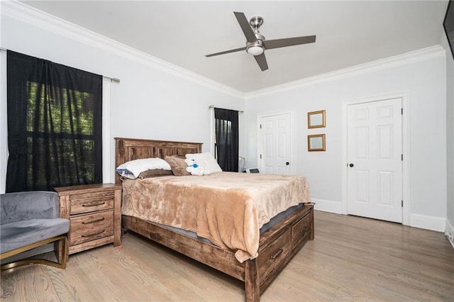 bedroom with ceiling fan, crown molding, and light wood-type flooring