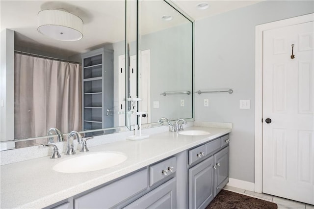 bathroom featuring vanity and tile patterned floors