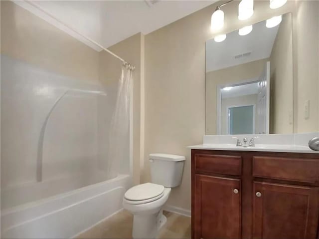 full bathroom with vanity, toilet, and shower / bath combo with shower curtain