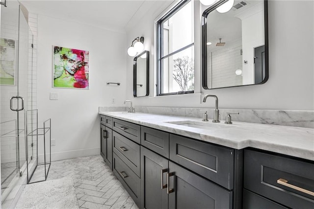 bathroom featuring a stall shower, visible vents, a sink, and double vanity