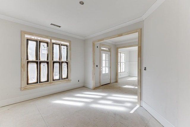 spare room with crown molding