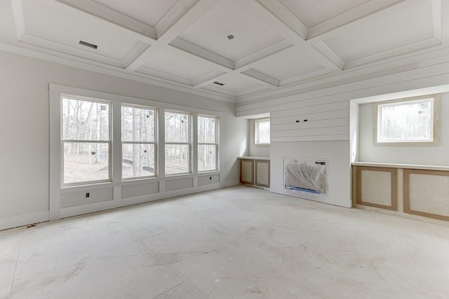 unfurnished living room with beamed ceiling and coffered ceiling