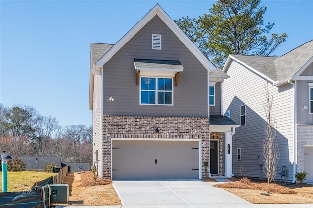 view of front of house with concrete driveway, brick siding, and an attached garage