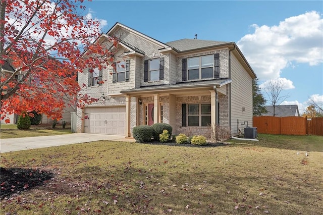 view of front of house featuring a front yard, a garage, and cooling unit