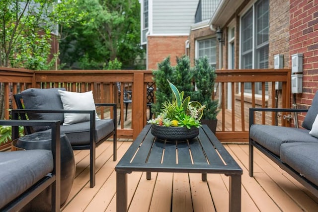 wooden deck featuring an outdoor living space