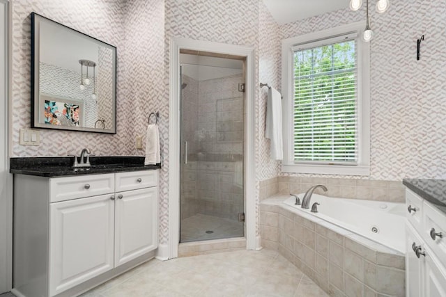 bathroom with vanity, tile patterned flooring, a stall shower, and a bath