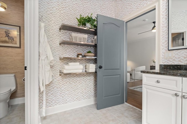 full bath featuring a tub with jets, wallpapered walls, a shower stall, and vanity