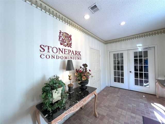 3020 Wingate Way, Sandy Springs, GA 30350 - doorway featuring a textured ceiling, french doors, visible vents, and recessed lighting