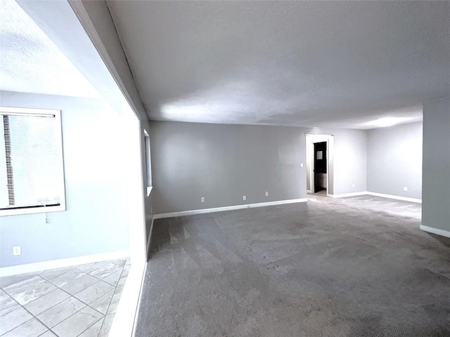 3020 Wingate Way, Sandy Springs, GA 30350 - spare room with baseboards and a textured ceiling
