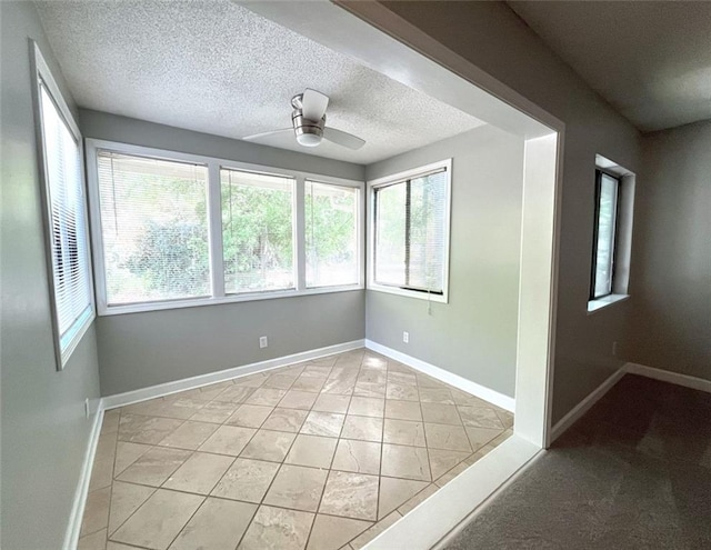 3020 Wingate Way, Sandy Springs, GA 30350 - unfurnished room featuring ceiling fan, baseboards, and a textured ceiling
