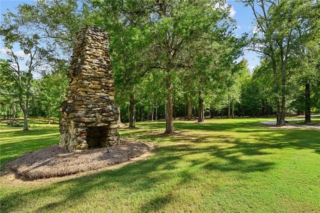 view of home's community with a lawn