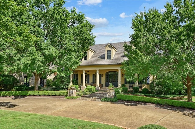 view of front of property featuring covered porch