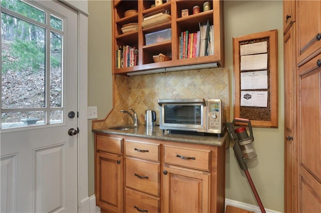 79 Strawberry Way, Jasper, GA 30143 - kitchen with tasteful backsplash, healthy amount of natural light, and open shelves