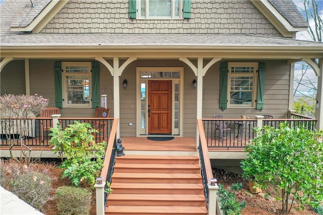79 Strawberry Way, Jasper, GA 30143 - view of exterior entry with a shingled roof and a porch