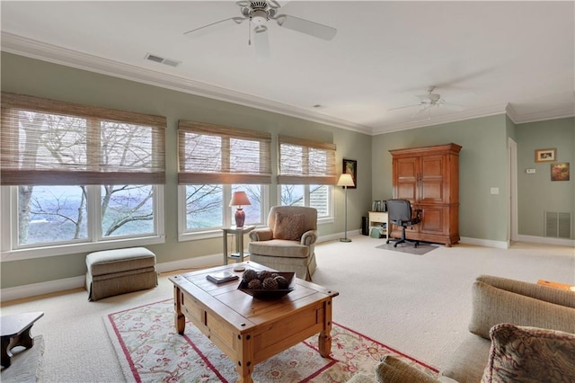 79 Strawberry Way, Jasper, GA 30143 - living room featuring a ceiling fan, light carpet, an office area, ornamental molding, and plenty of natural light