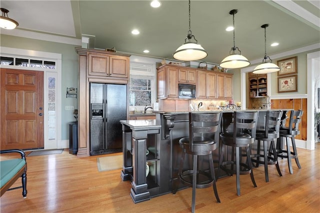 79 Strawberry Way, Jasper, GA 30143 - kitchen featuring black appliances, tasteful backsplash, light wood-style floors, recessed lighting, and decorative light fixtures