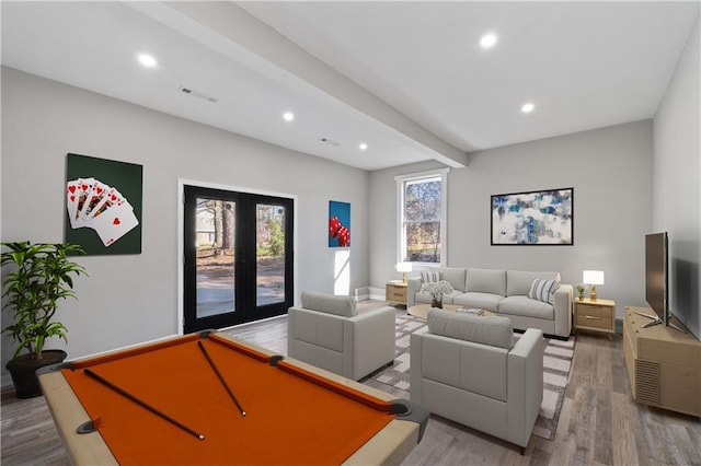 living area with visible vents, beamed ceiling, billiards, recessed lighting, and wood finished floors