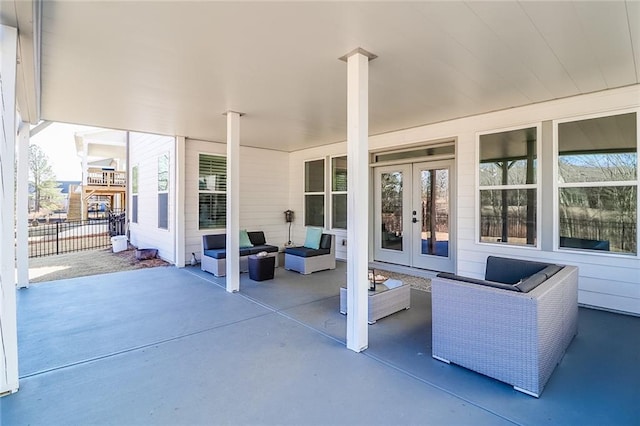 view of patio / terrace with an outdoor hangout area and french doors