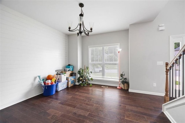 1016 Buckeye Ln, Villa Rica, GA 30180 - playroom with wood finished floors, a chandelier, and baseboards
