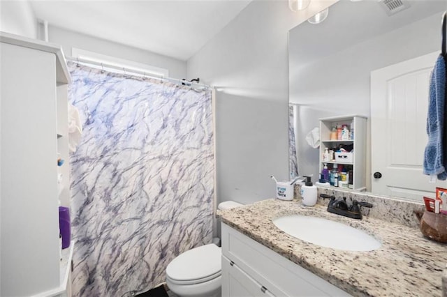 1016 Buckeye Ln, Villa Rica, GA 30180 - full bath featuring vanity, toilet, and a shower with shower curtain