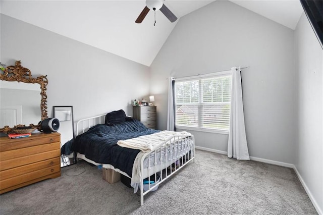 1016 Buckeye Ln, Villa Rica, GA 30180 - bedroom with carpet flooring, vaulted ceiling, a ceiling fan, and baseboards