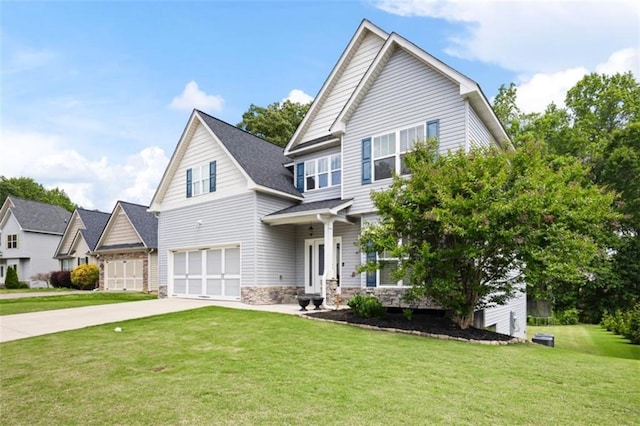 1016 Buckeye Ln, Villa Rica, GA 30180 - view of front of home featuring concrete driveway, an attached garage, stone siding, and a front lawn