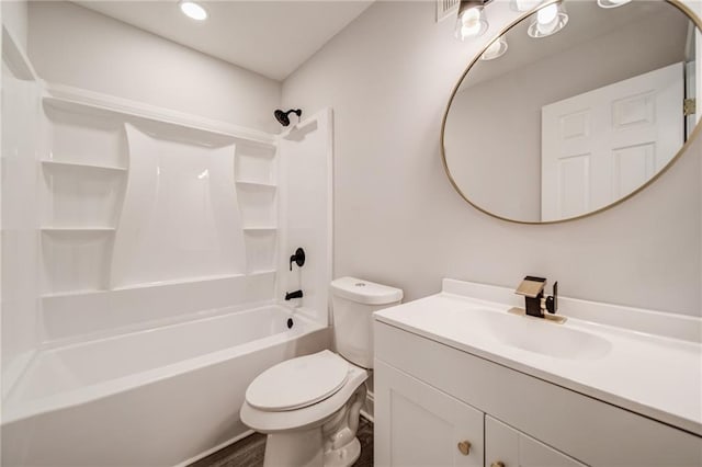 full bathroom featuring vanity, toilet, and washtub / shower combination