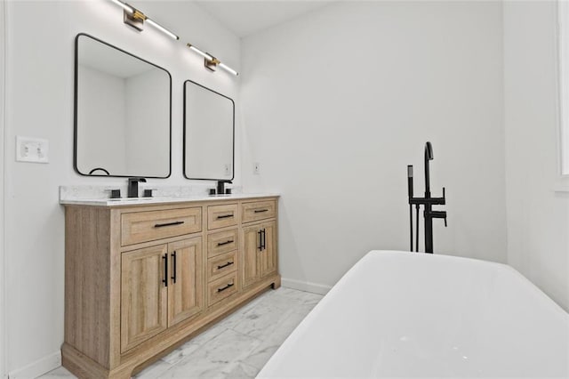 bathroom with vanity and a bathtub