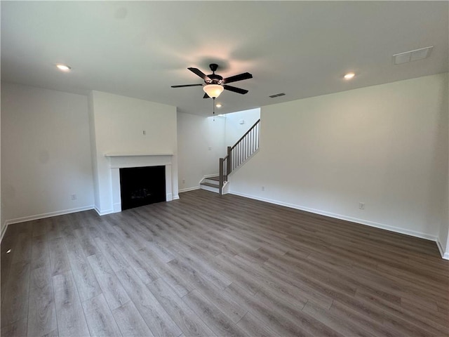 23 Gresham Ct, Dawsonville, GA 30534 - unfurnished living room featuring stairway, ceiling fan, dark wood-style floors, recessed lighting, and a fireplace