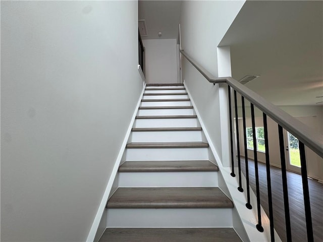 23 Gresham Ct, Dawsonville, GA 30534 - staircase with wood finished floors and baseboards