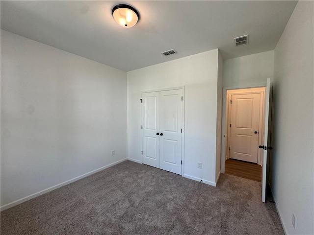 23 Gresham Ct, Dawsonville, GA 30534 - unfurnished bedroom featuring carpet and a closet