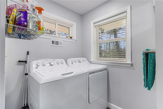 laundry room with laundry area and washing machine and dryer