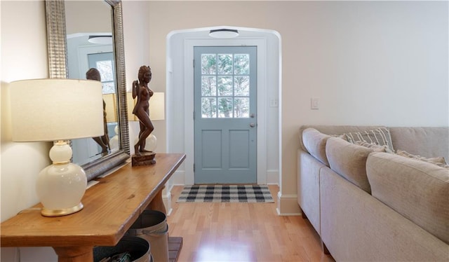 entryway with light wood-style floors