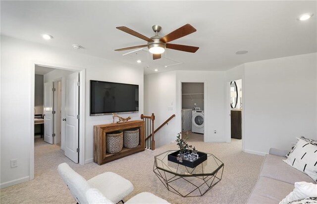living room with recessed lighting, ceiling fan, light carpet, and baseboards