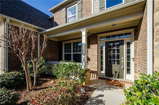 entrance to property with a porch