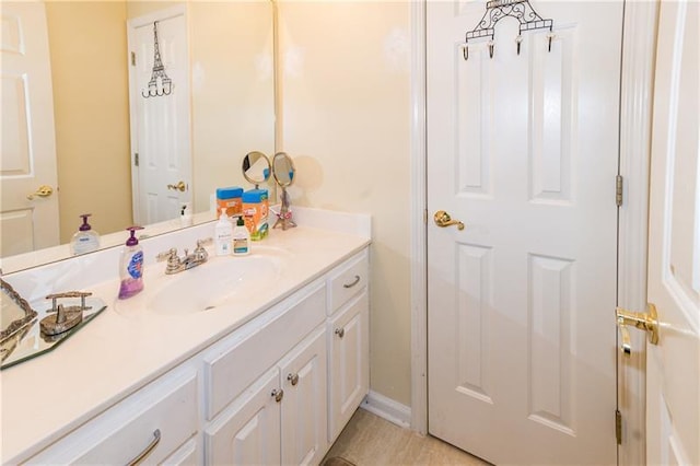 bathroom with vanity and tile patterned flooring