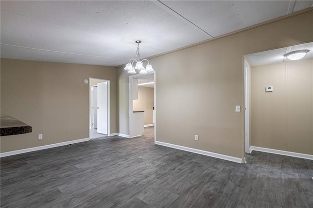 unfurnished dining area featuring dark wood-type flooring and a chandelier