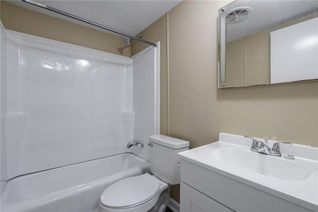 full bathroom featuring vanity, toilet, washtub / shower combination, and a textured ceiling