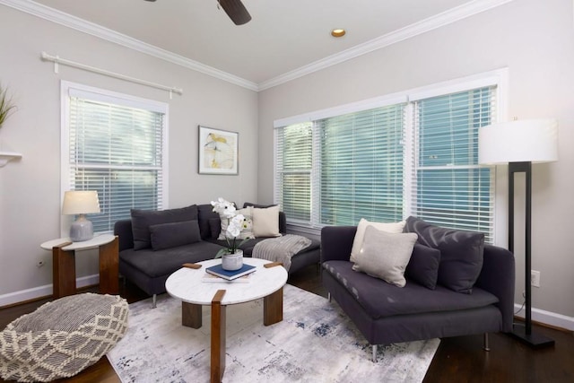 living room featuring crown molding, wood-type flooring, and ceiling fan