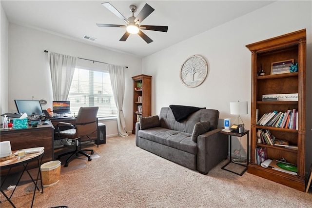 office with ceiling fan and carpet