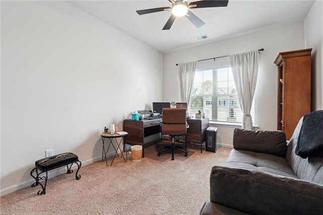 office featuring ceiling fan and light colored carpet