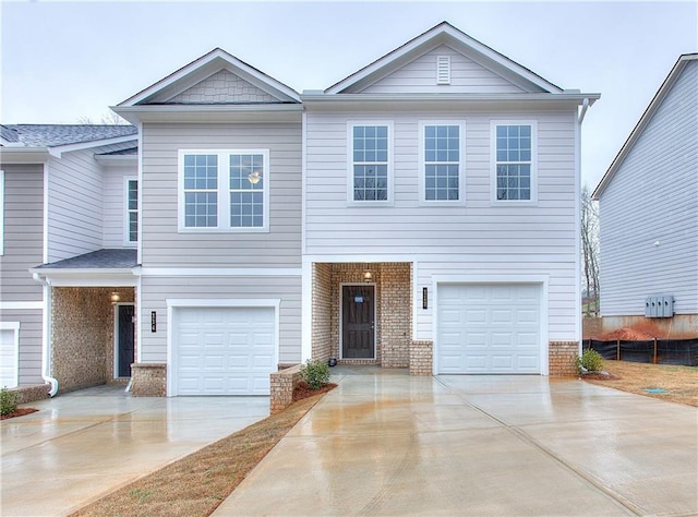 view of front of property featuring a garage