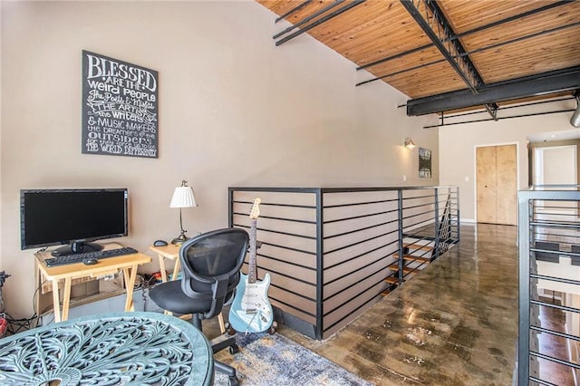 1133 Church St Unit 1, Covington, GA 30014 - home office with wooden ceiling, baseboards, beamed ceiling, and concrete floors