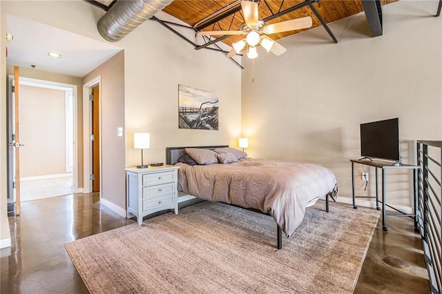 1133 Church St Unit 1, Covington, GA 30014 - bedroom with concrete flooring, wooden ceiling, baseboards, and a towering ceiling