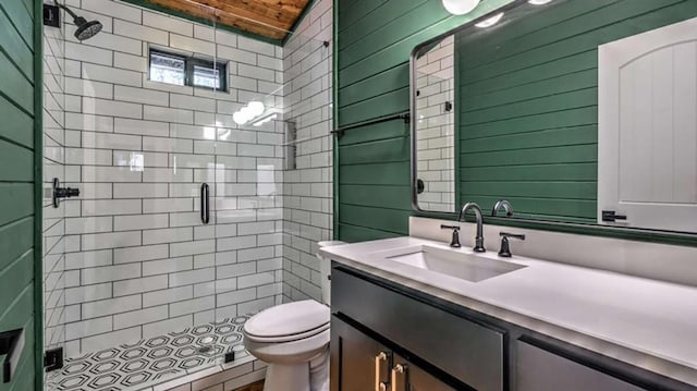 bathroom with vanity, toilet, wooden ceiling, and a shower stall