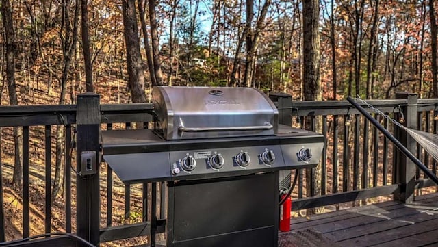 wooden deck with area for grilling