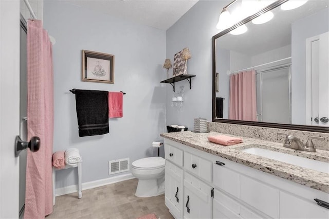 6863 Recreation Ln, Acworth, GA 30102 - bathroom featuring baseboards, a shower with curtain, toilet, and vanity