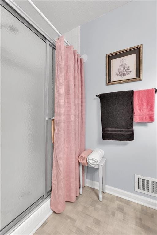 6863 Recreation Ln, Acworth, GA 30102 - full bath with a stall shower and baseboards