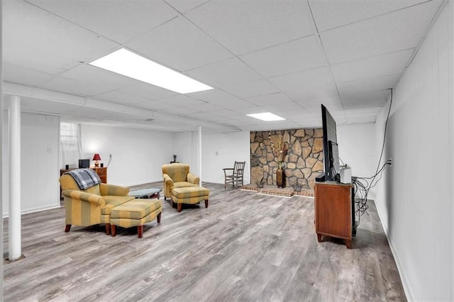6863 Recreation Ln, Acworth, GA 30102 - living area featuring wood finished floors, baseboards, and a fireplace